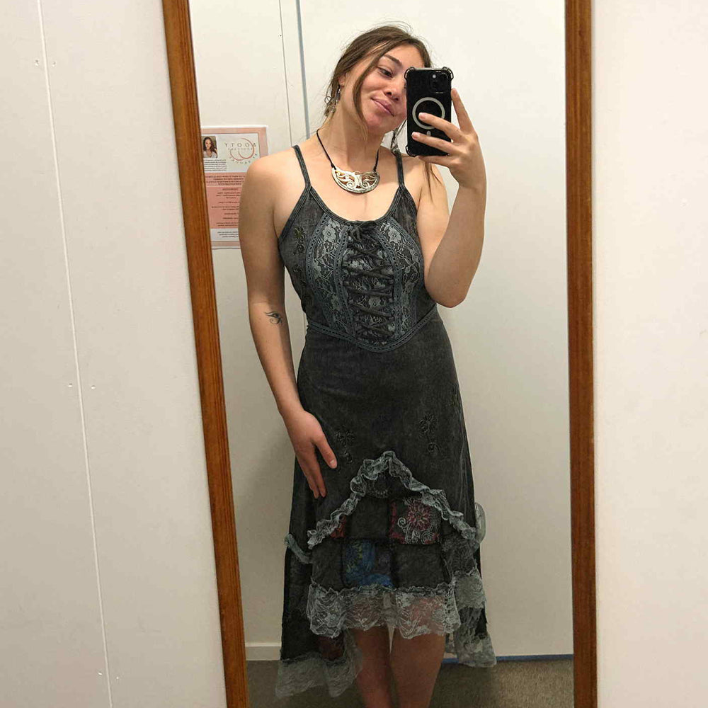 
                  
                    Load image into Gallery viewer, Person wearing a dark lace dress taking a mirror selfie.
                  
                