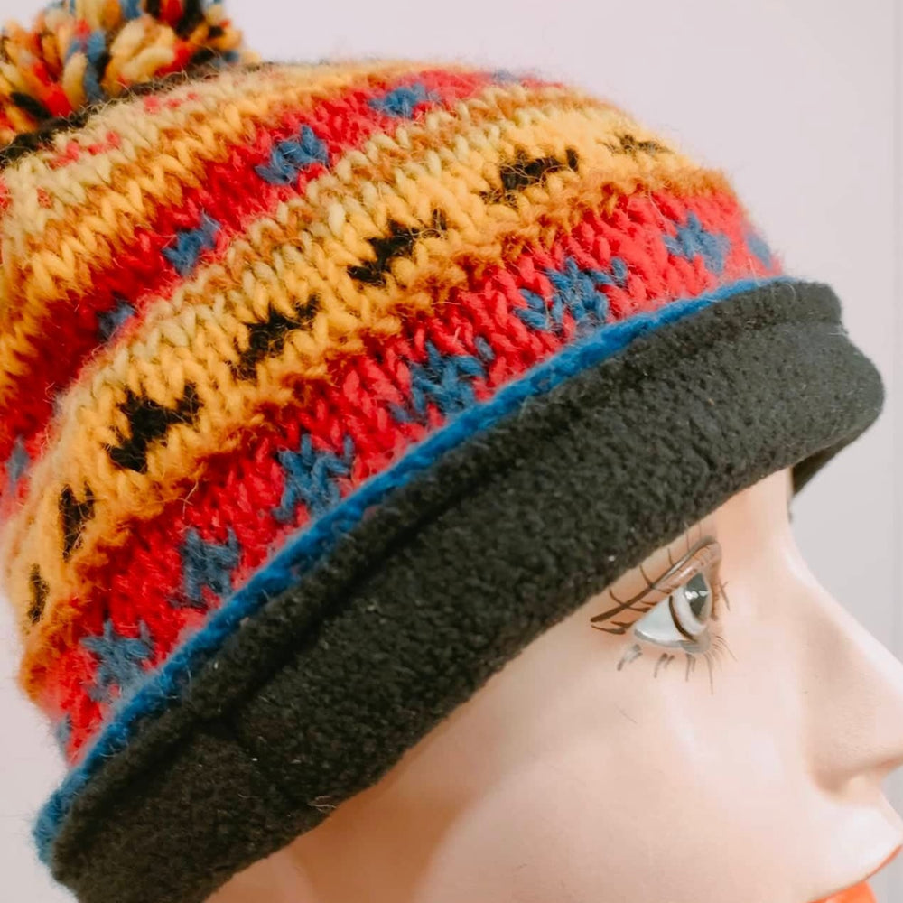 
                  
                    Load image into Gallery viewer, Wool Stripe Pom-Pom Hat
                  
                